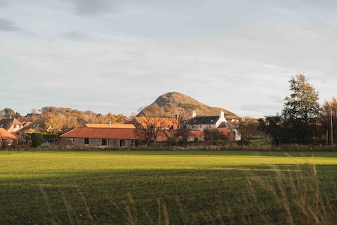 Original Stone Barn Reimagined as a Chic Minimalist Hideaway