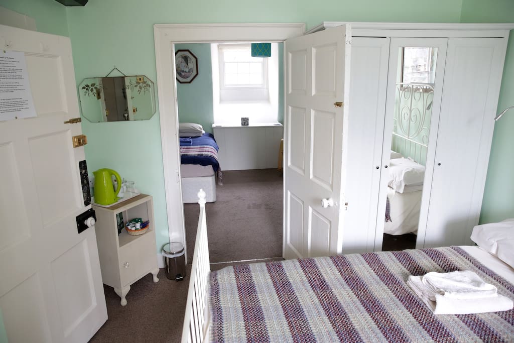 Adjoining room with two single beds