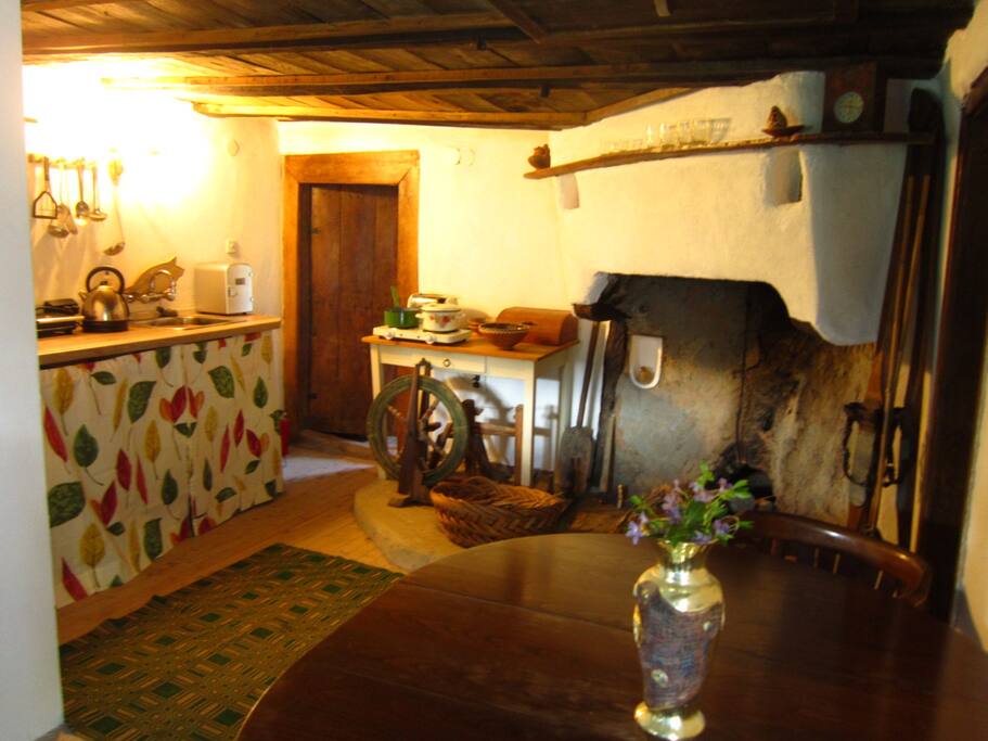 The livingroom with many follklore items and features.