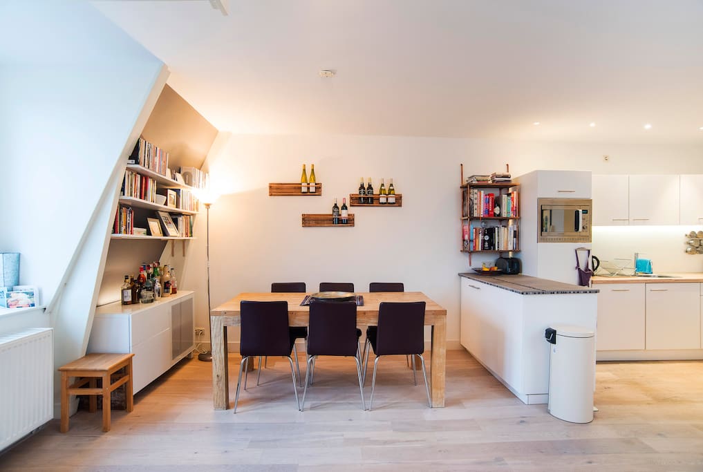 Open-plan, airy and light - the living area, dining area and kitchen