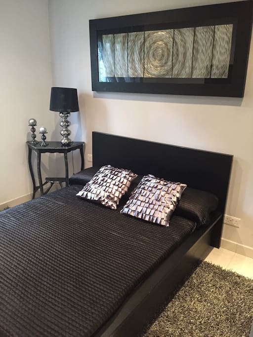 The main bedroom consists of a double bed, a wall to wall wardrobe and also had a 32" TV, DVD Player and an A/C unit.