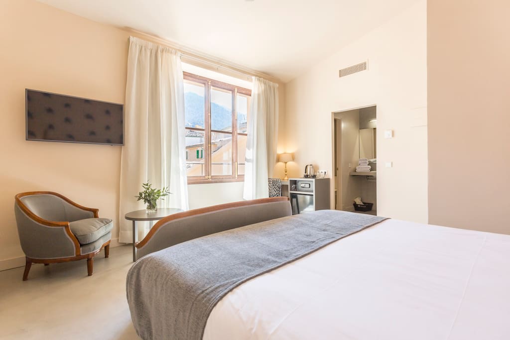 The bedroom comes with a Smart TV and lovely views over the village.