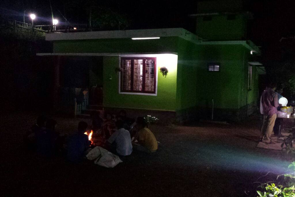 guest enjoying camp fire