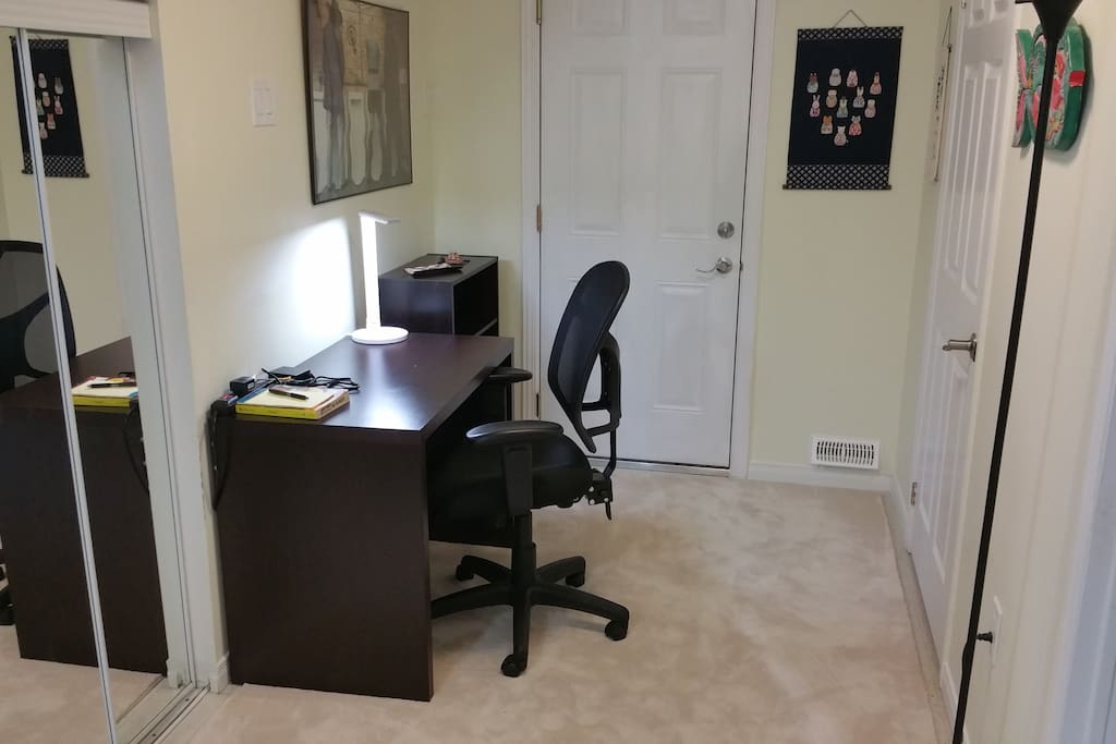 Office nook with a desk, a comfortable office chair (really) and wifi and wired internet.
