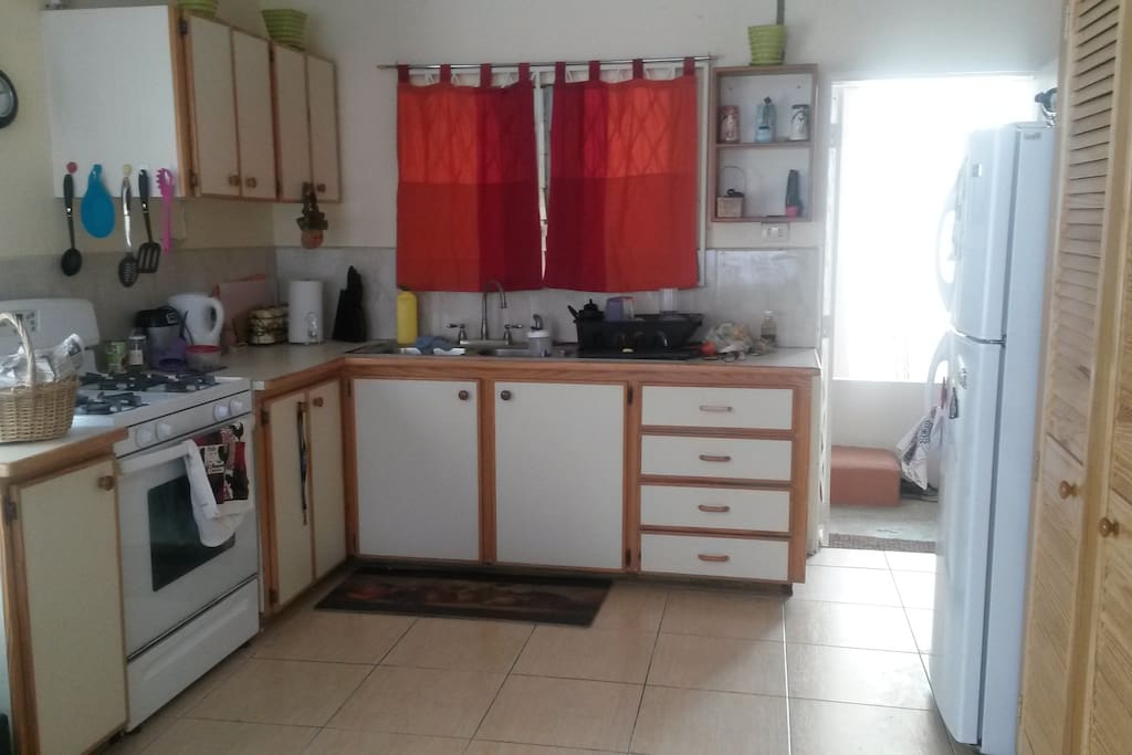 Clean and spacious kitchen with all amenities,
large pantry next to the refrigerator