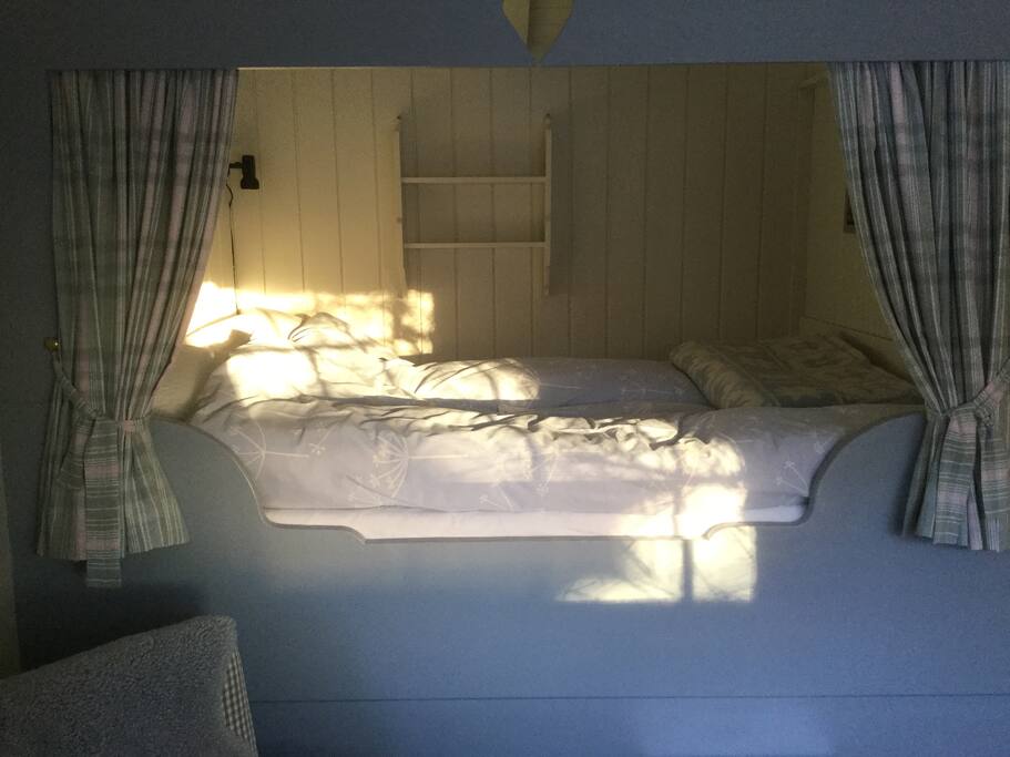 Two small steps up to the double bed
