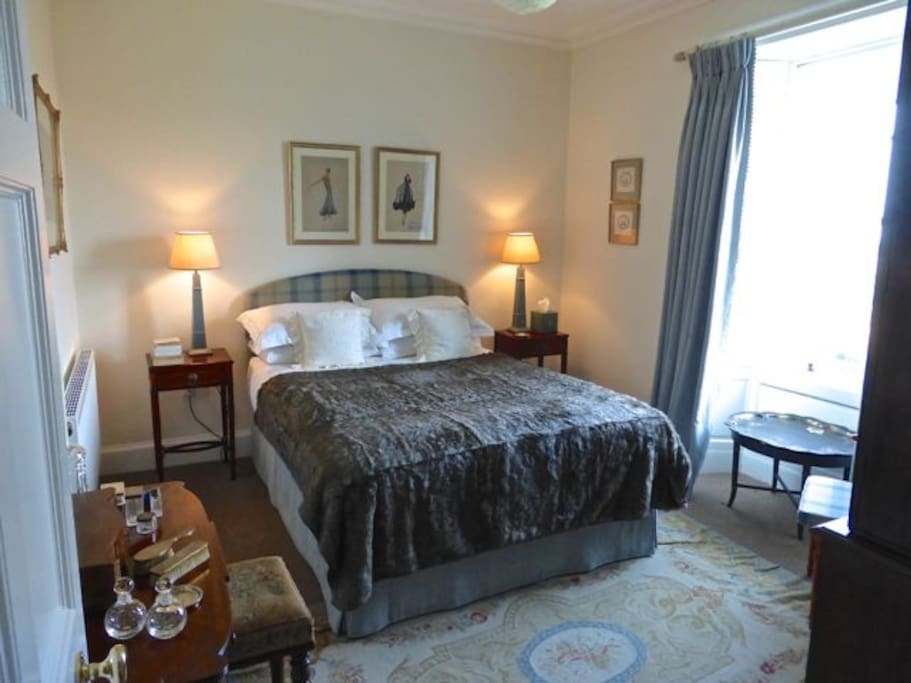 Blue bedroom with private bathroom