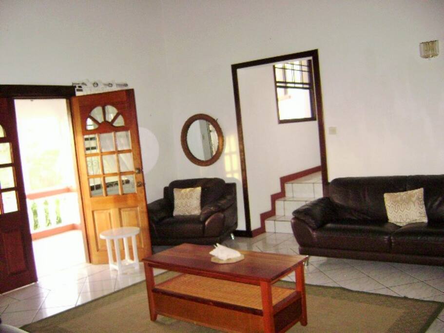 Living room - opens onto a balcony over looking a valley and southern coast