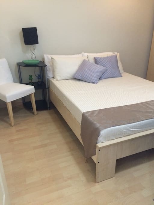 Full size bed on the bedroom