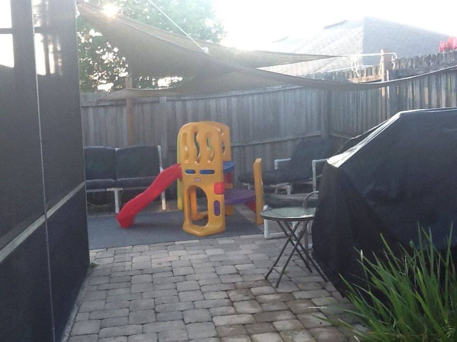 backyard with grill and sitting area