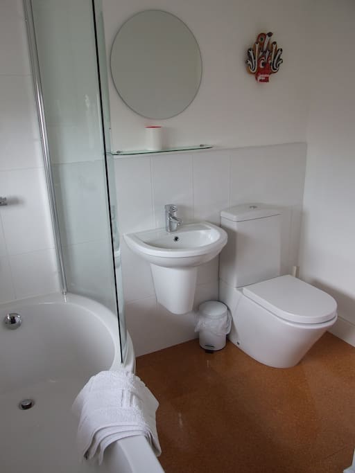 Bathroom with shower and bath