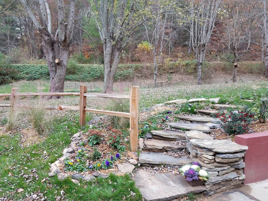 Carolina stone walkway to the front door of the home.