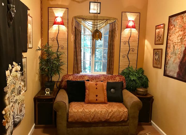 Pull out the sofa for a twin bed in this tiny, cozy room.
