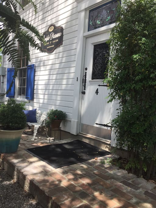Carriage house unit #4 entrance has a small sitting area outside the door with birdfeeders. Great for smokers. This area is behind a 6 foot privacy fence. Check-in must be scheduled with your host John.