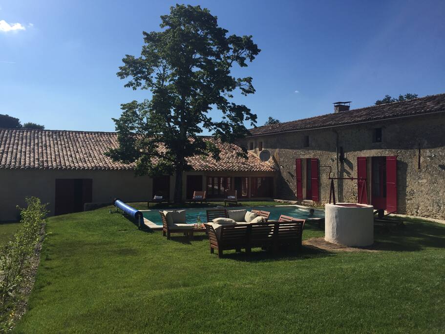 The south-facing courtyard contains the swimming pool and seating area