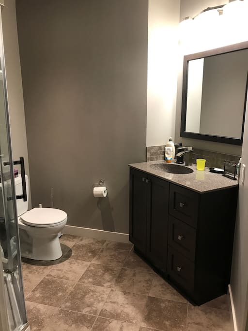 While the bathroom is mostly private, it's still available to the kids while they're playing. It has heated floor tiles.