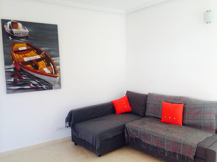 Living area with large screen TV with over 40 channels