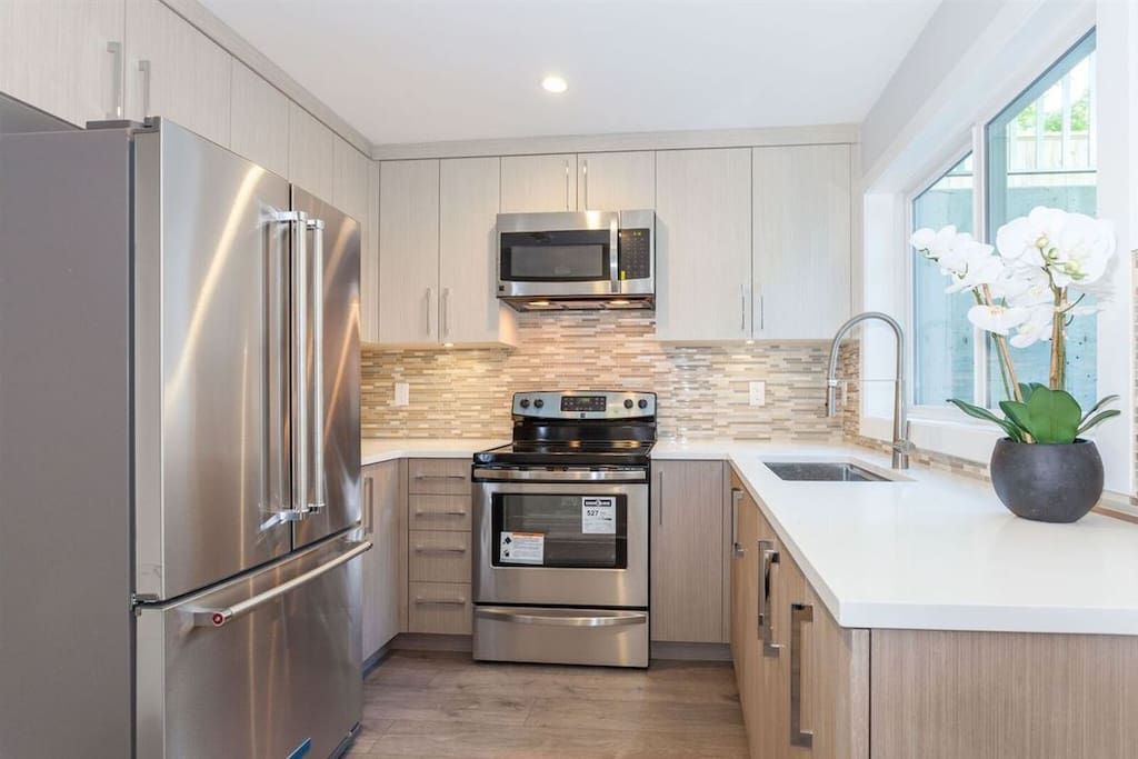Fully equipped kitchen with stainless steel appliances