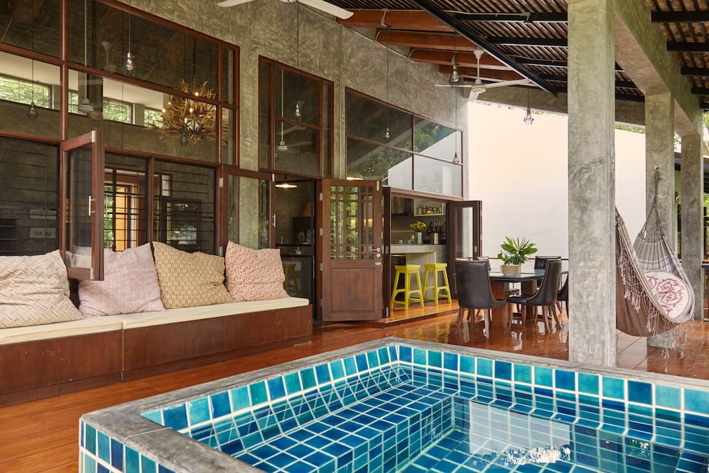 Lovely balcony with hammock, dining area and plunge puddle.