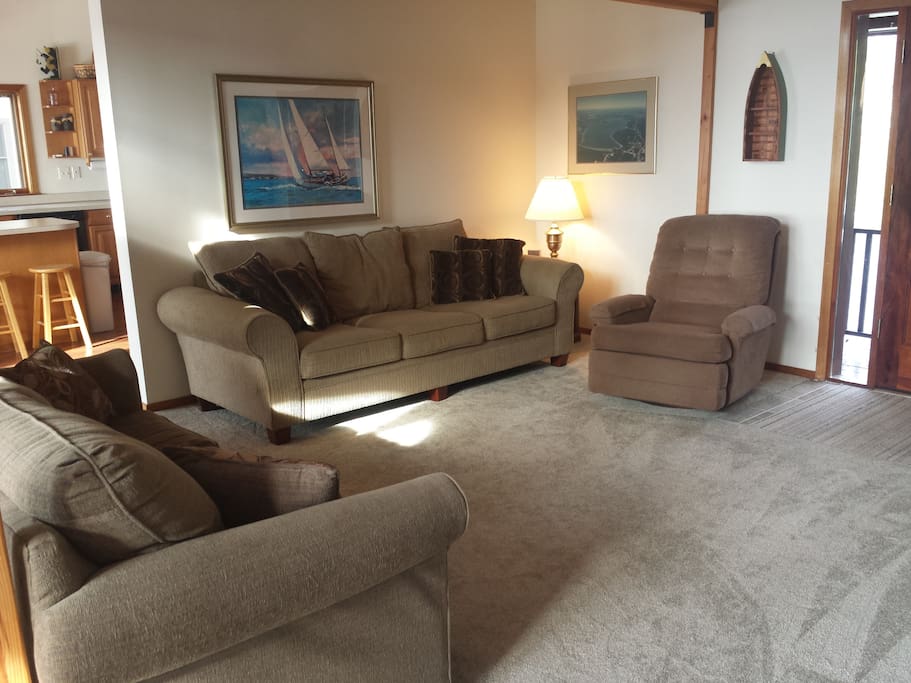 Living Room with 80" couch & full size bed sleeper sofa