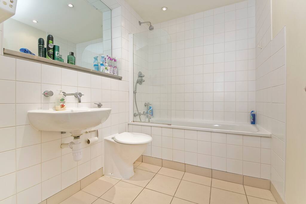 Bathroom with shower over bath