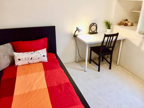 Cozy bedroom in a shared house.