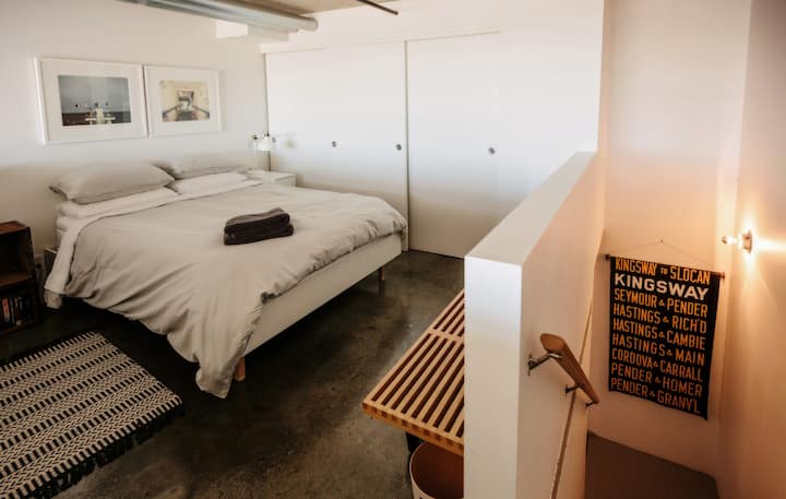 Upstairs bedroom features a queen sized bed with a firm organic latex mattress, 4 pillows, cotton sheets and duvet. 
The washer+dryer, drying rack, dresser, hangers, mattress pad and additional towels + linens are located in the bedroom closet.