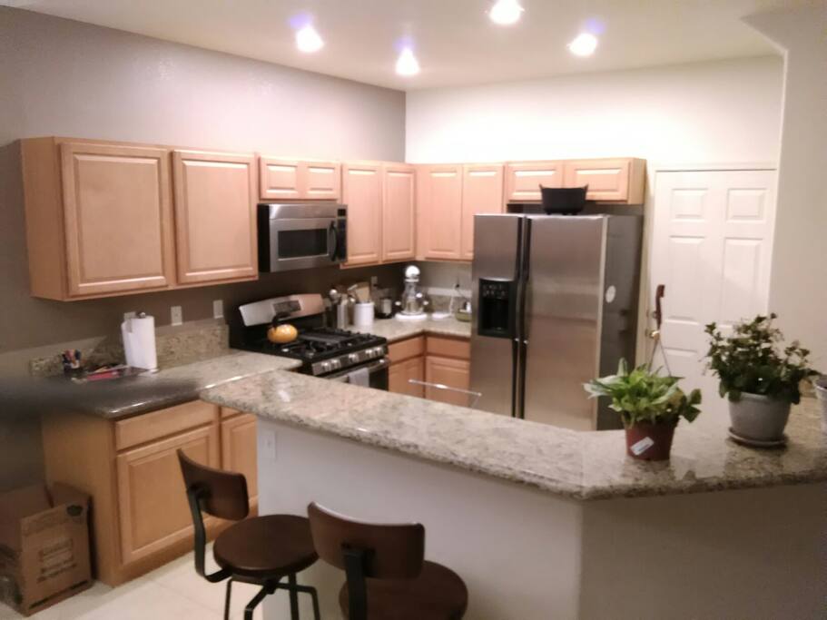 My beautiful kitchen with granite countertops and new barstools.
