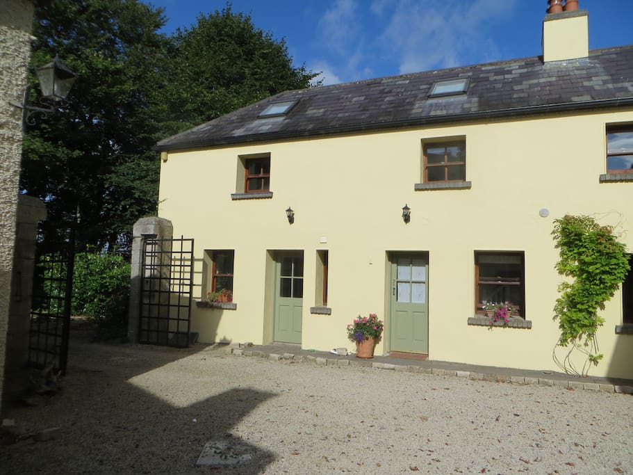 The coach house is situated off the courtyard from the main house