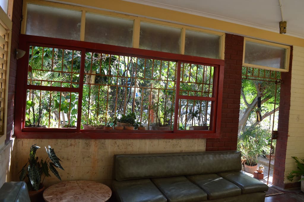 Have breakfast, read, hangout or smoke just beside a small forest.