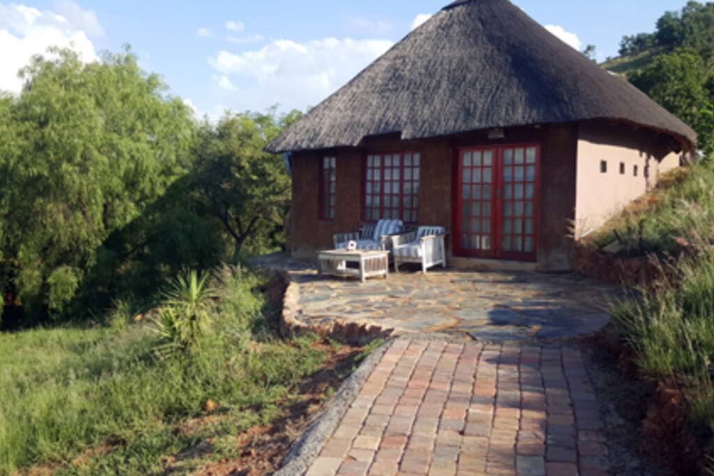 Thatch roof cottage.