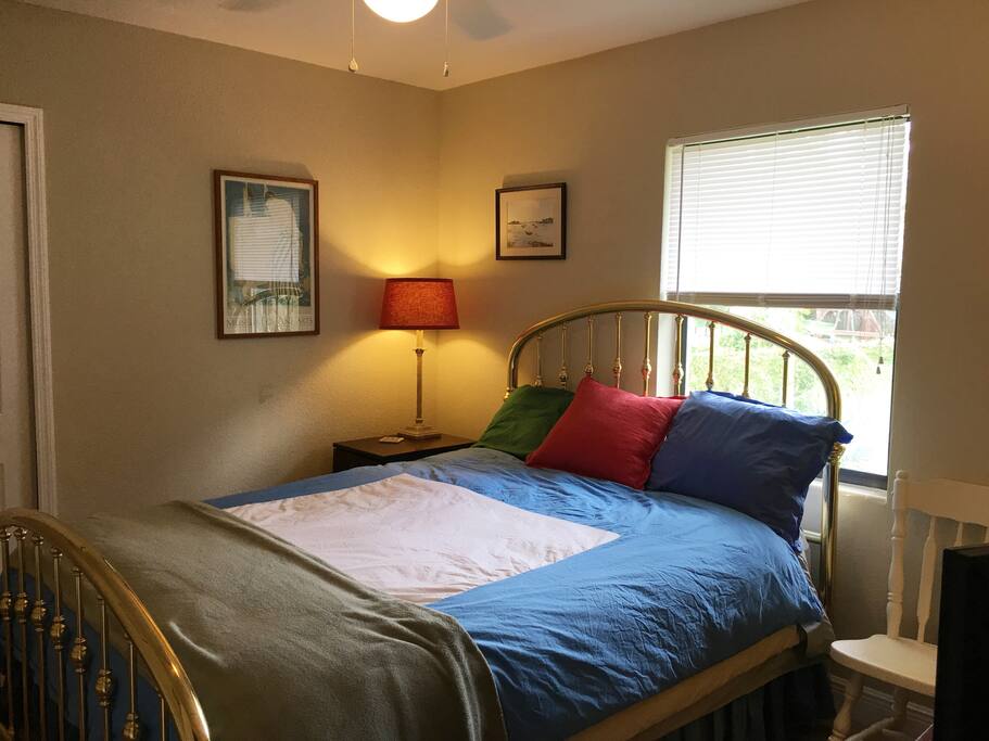 Private room with queen-size bed, firm mattress