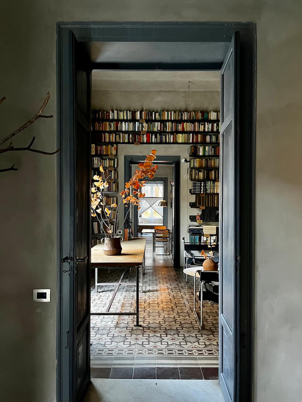 A designer's Art Nouveau flat lined with books, Palermo, Sicily, Italy, photo 2 of 10