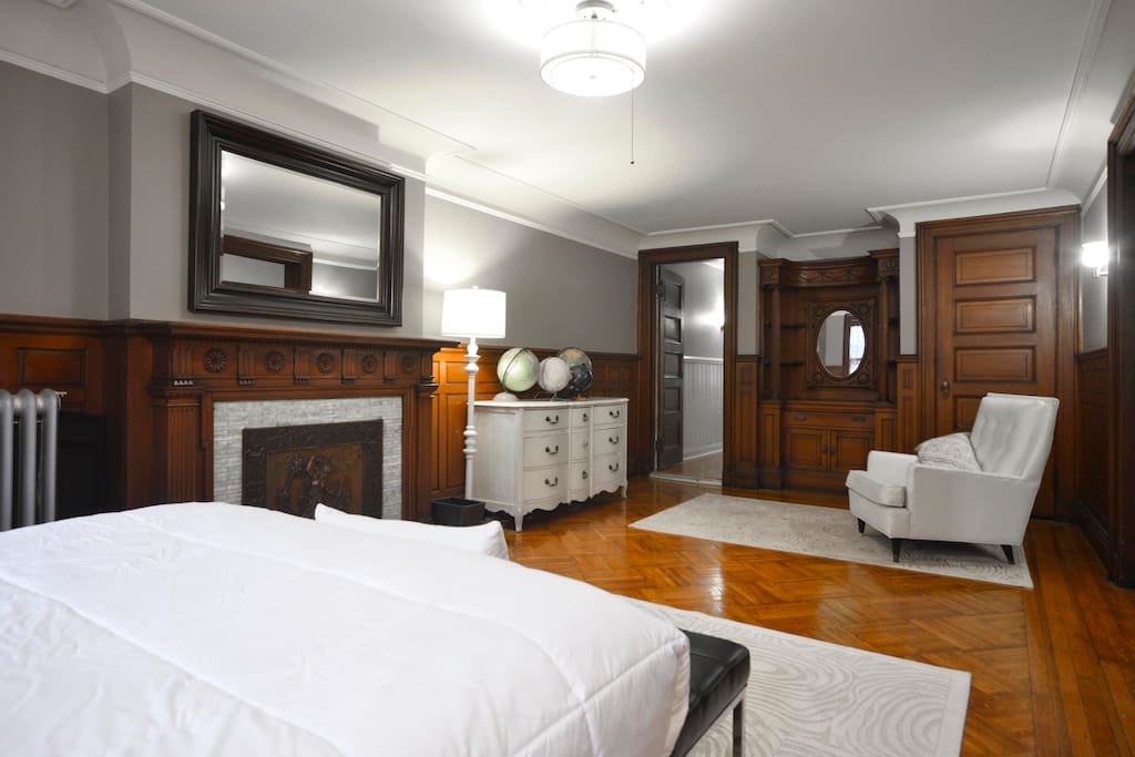 A built in vanity, bookshelf, and fireplace are just a few examples of the old world charm of this space.