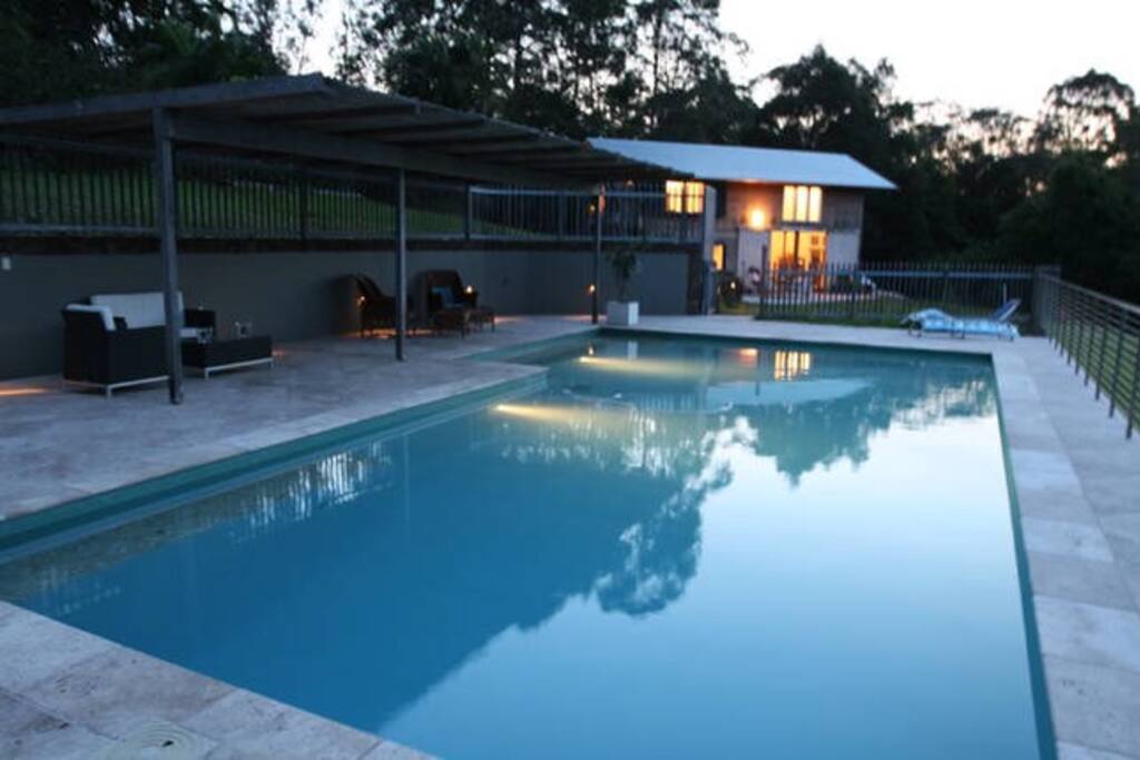 The barn and pool at dusk