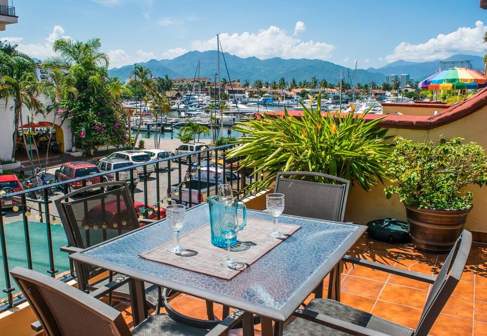 Enjoy relaxing on the massive terrace overlooking the Marina Dock area.