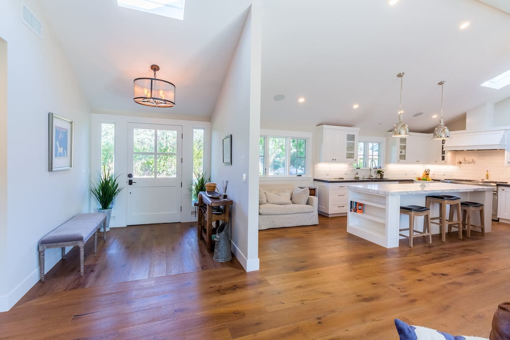 View of the entry way and kitchen.