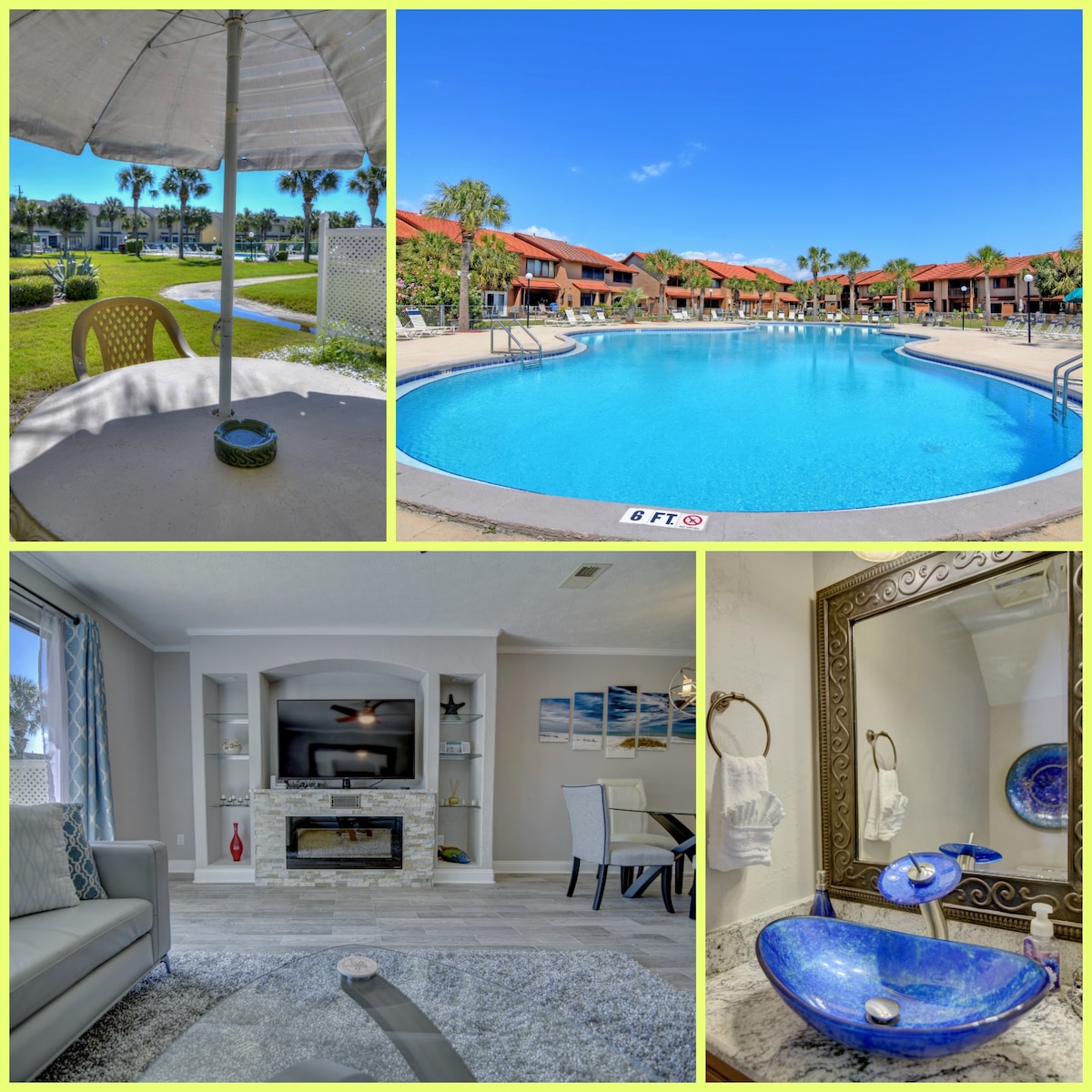 A sunny outdoor area features a round table with chairs and an umbrella, providing a shaded spot to relax. In the background, a large swimming pool is visible, surrounded by palm trees and resort-style buildings under a clear blue sky. An inviting living space includes a gray sofa and a modern entertainment unit, while a sleek bathroom showcases a decorative sink and mirror.
