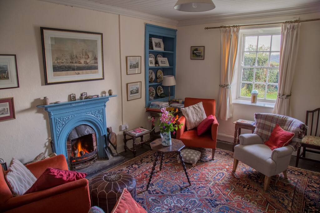 The old cast iron fireplace burns logs and turf briquettes. There will be enough available for your first night. More can be bought in the nearby village shop.