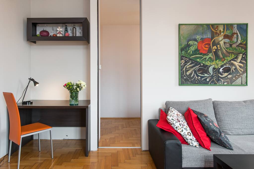 Working desk, and entrance to bedroom