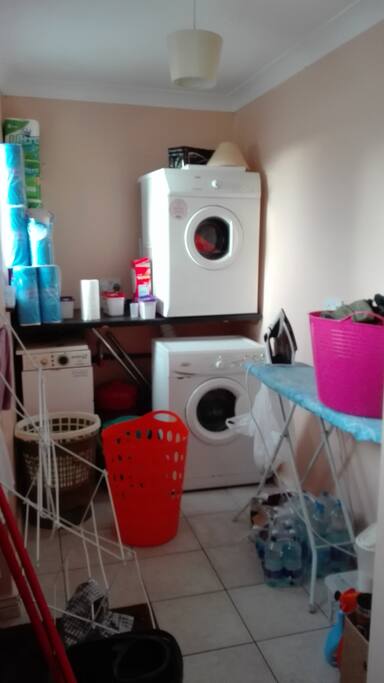 we have a washing machine, dryer and ironing board for communal use :)