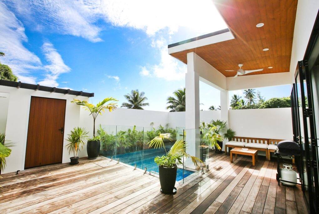 Glass fencing around pool