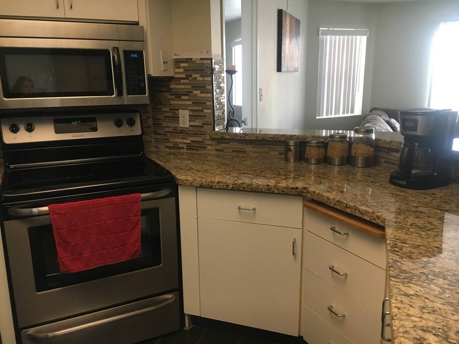 microwave, stove and coffee maker