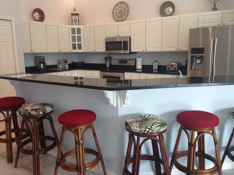 Granite counter in kitchen with stainless steel appliances