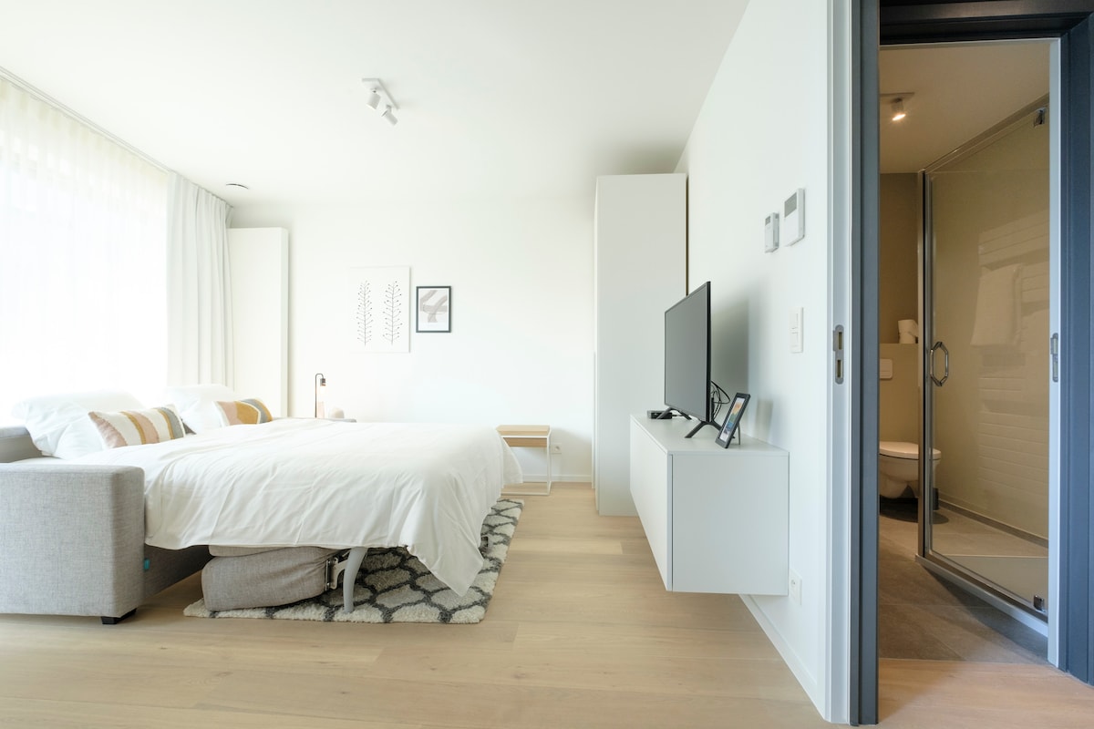 Rincón para dormir y baño