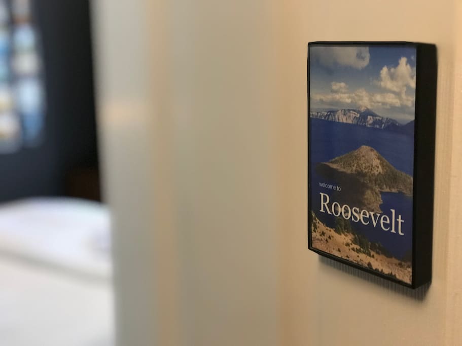 The Roosevelt Room is marked with a sign and photo of Crater Lake National Park in Oregon.