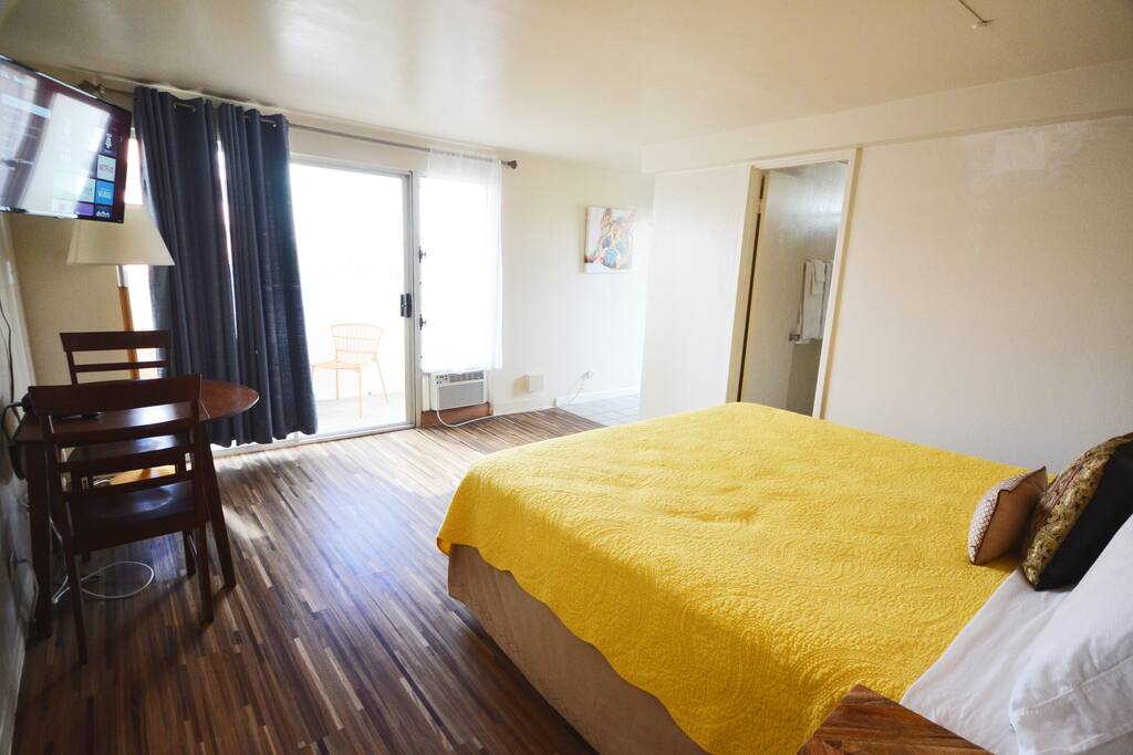Spacious studio with laminate flooring