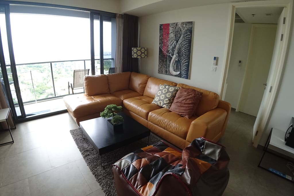 Living room with leather sofa, nice and big space