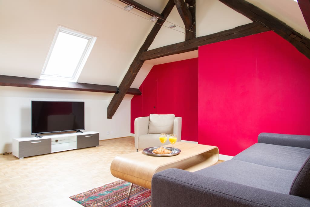 The living room has a flat screen TV with cable. There is free Wi-FI throughout.