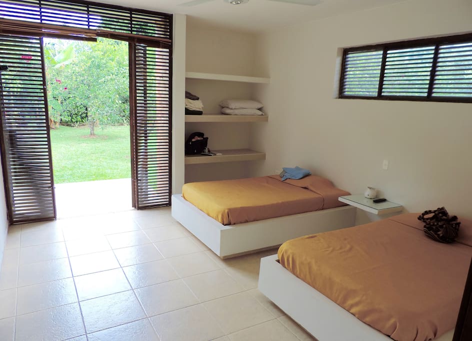 Bedroom downstairs with bathroom and direct access to garden. (2 People)